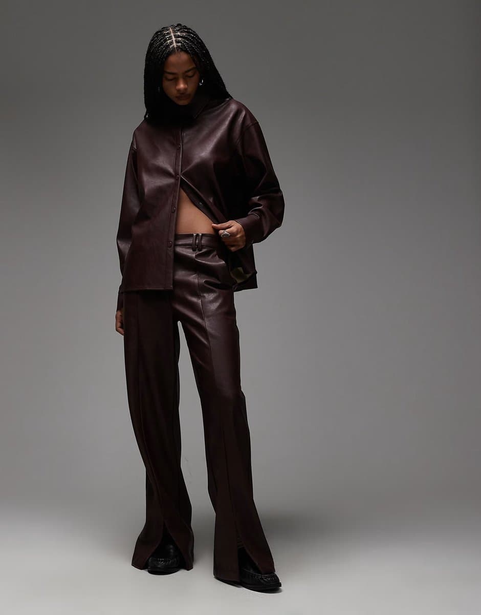 ASOS ASOS DESIGN mid rise straight leg faux leather trousers co-ord  with split hem in plum 