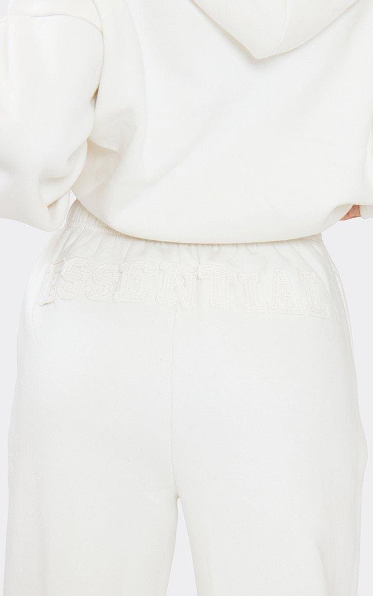 EGO Low Rise Essential Graphic Back Detail Straight Leg Joggers In Cream, Women's Size UK 6 - 2